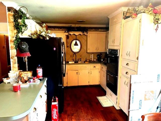 1525 Mansfield Road Reno, TX 75462 - Photo 30 of 34 a bathroom with a sink mirror and cabinets