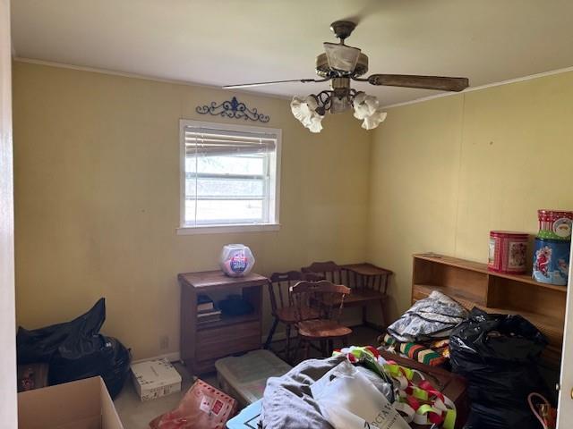 1525 Mansfield Road Reno, TX 75462 - Photo 7 of 34 a bedroom with a bed and a chandelier