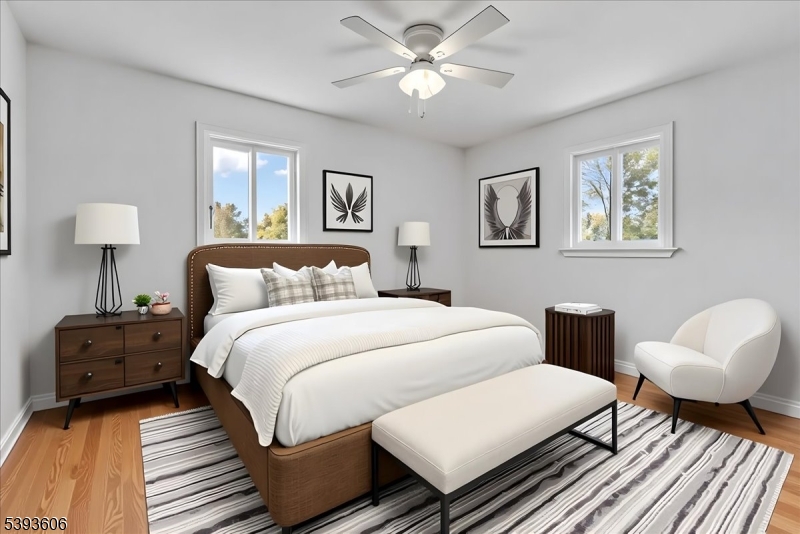 60 Kenvil Avenue Succasunna, NJ 07876 - Photo 19 of 28 a bedroom with a bed and a chandelier