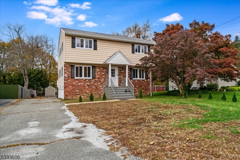 60 Kenvil Avenue Succasunna, NJ 07876 - Photo 2 of 28 a front view of a house with a yard