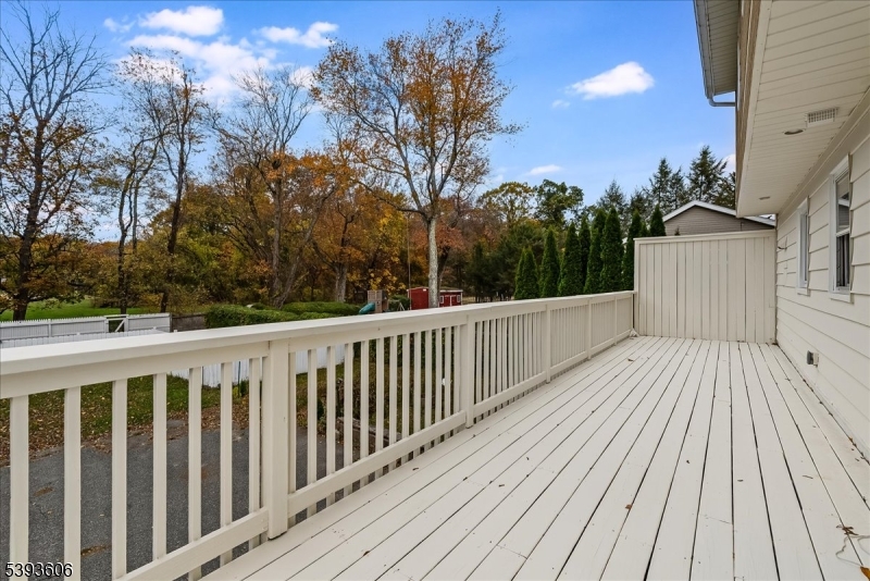 60 Kenvil Avenue Succasunna, NJ 07876 - Photo 24 of 28 a view of balcony with wooden floor and fence