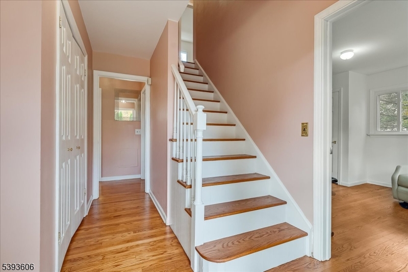 60 Kenvil Avenue Succasunna, NJ 07876 - Photo 5 of 28 a view of a hallway with wooden floor and entryway