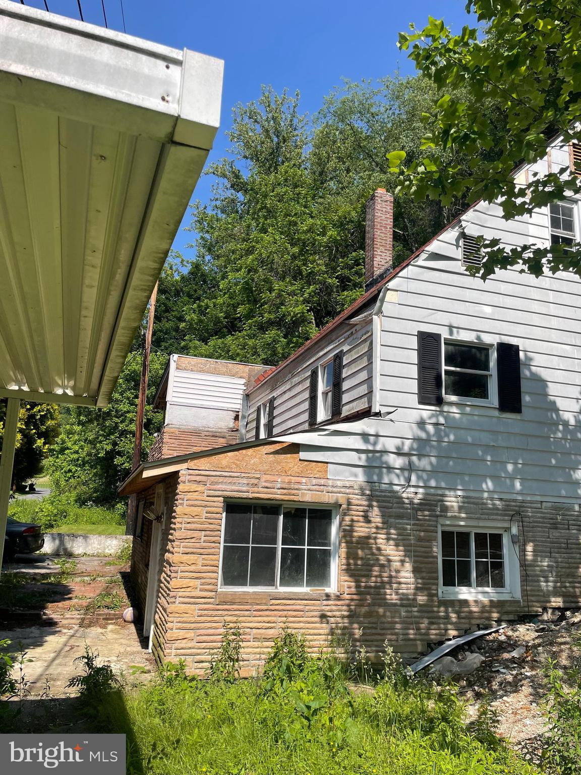 14602 Michael Road Northeast Cumberland, MD 21502 - Photo 5 of 20 a view of a house with a yard