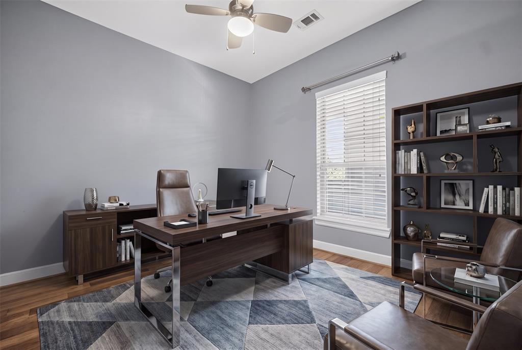 5015 Meridian Lane, Unit 2102 Addison, TX 75001 - Photo 3 of 36 Bright room with a ceiling fan, light gray walls, wood-finish flooring, and a large window with white blinds