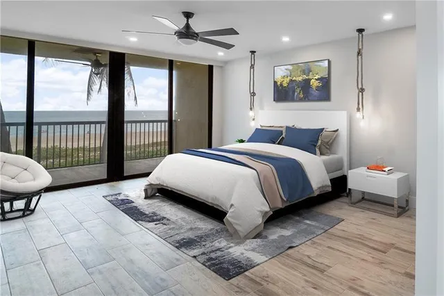 a spacious bedroom with a bed and a large window