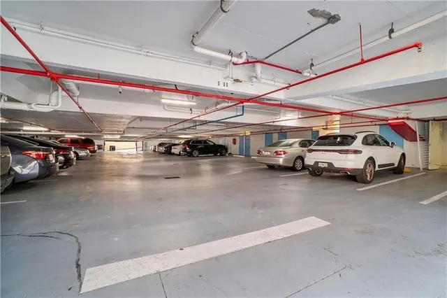 a swimming pool with outdoor seating and garden