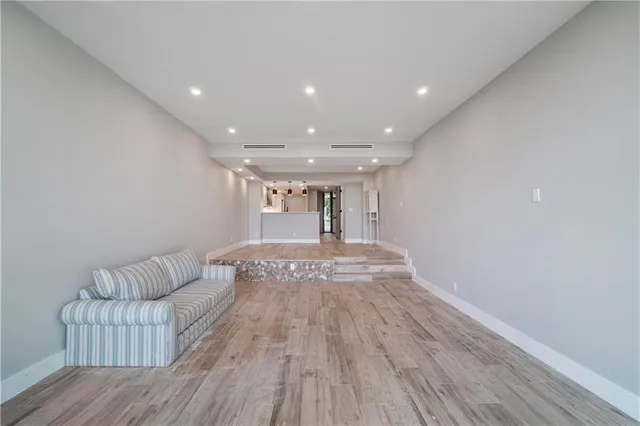 a view of livingroom with furniture and wooden floor