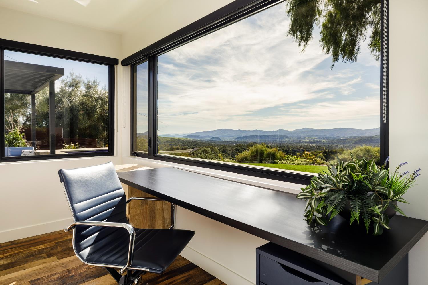 1417 Foothill Road Ojai, CA 93023 - Photo 26 of 41 a view of a balcony with furniture and a potted plant