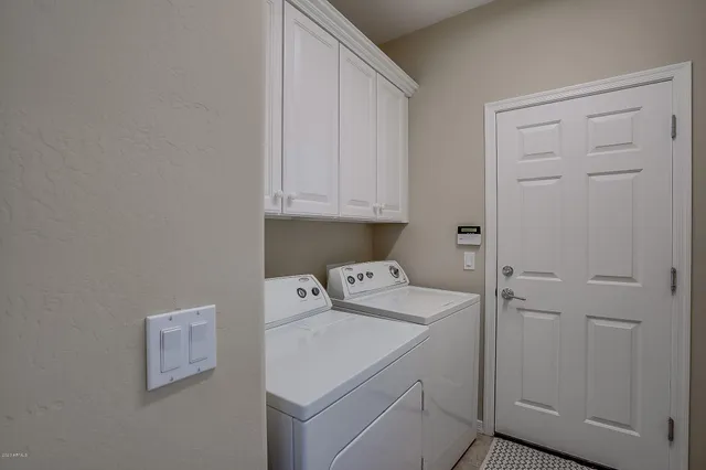 a living room with a couch and a table