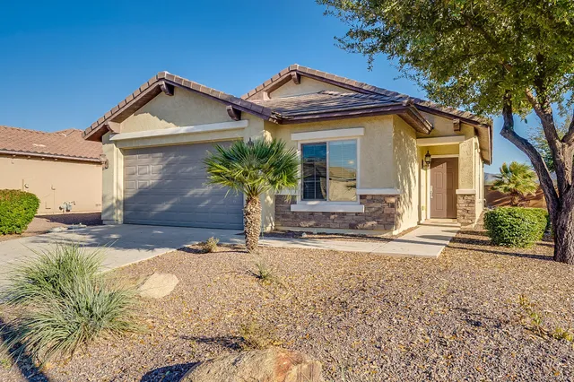a view of a city with lawn chairs