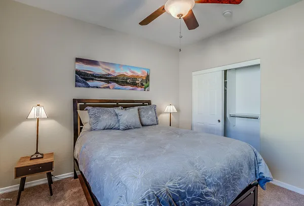 a view of a livingroom with furniture and a window