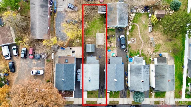 a city street filled with lots of traffic and tall buildings