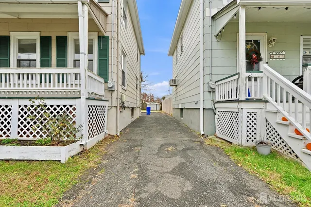front view of a house with a large window