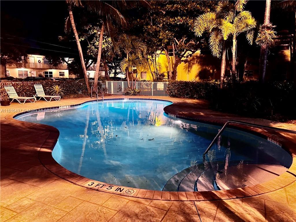 2607 Northeast 8th Avenue, Unit 19 Wilton Manors, FL 33334 - Photo 3 of 11 a view of a swimming pool