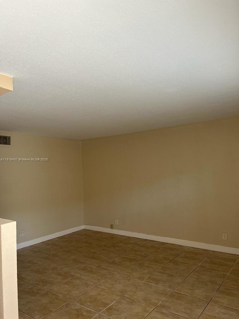 2607 Northeast 8th Avenue, Unit 19 Wilton Manors, FL 33334 - Photo 8 of 11 a view of an empty room