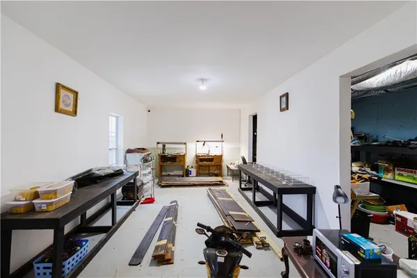 a room with furniture and a flat screen tv