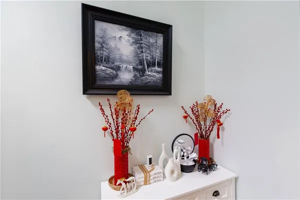 a picture of a wall with a potted plant on it