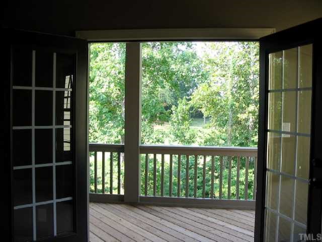 2820 Peachleaf Street Raleigh, NC 27614 - Photo 8 of 12 a view of a balcony with wooden floor