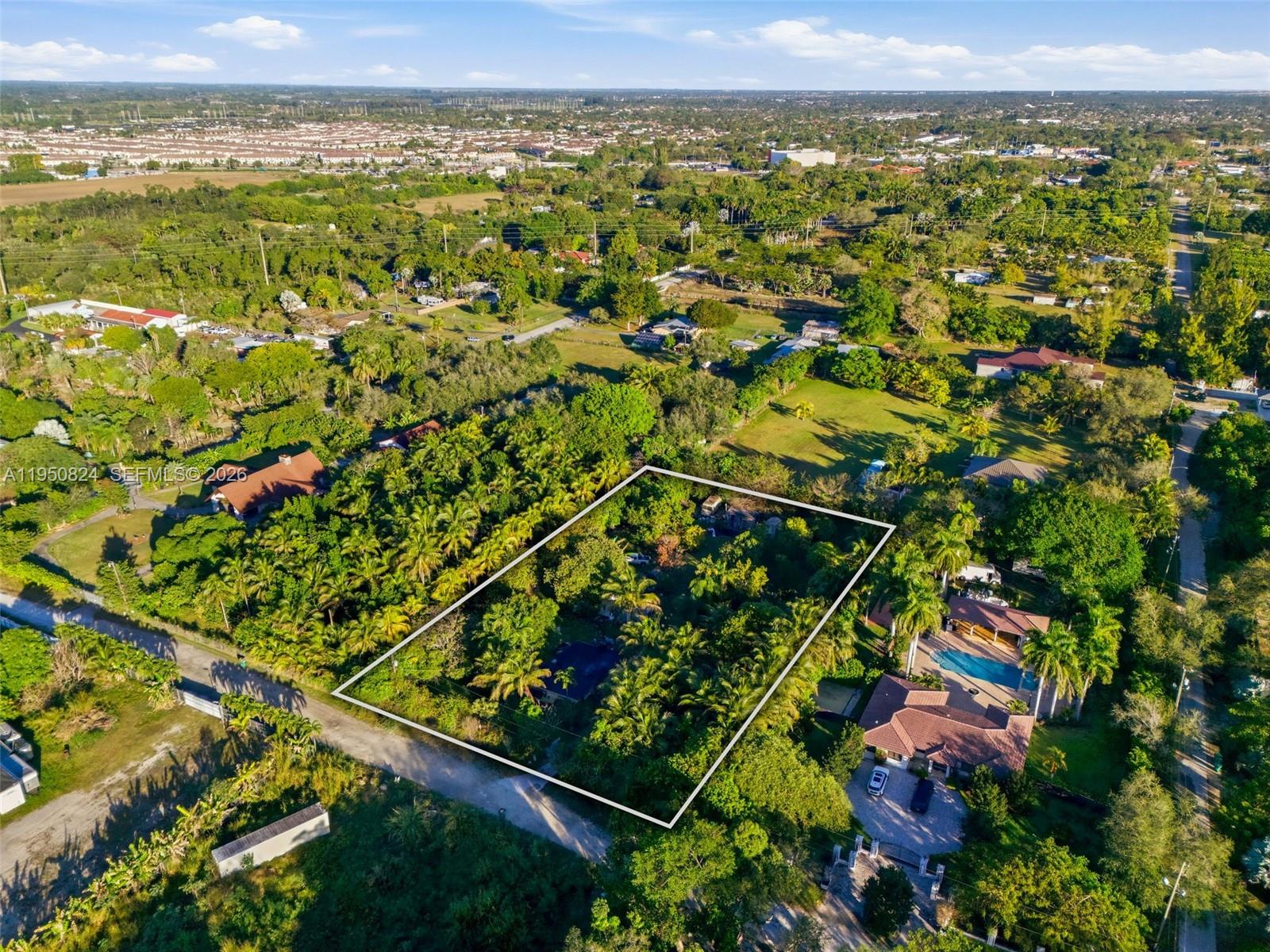 12325 Southwest 240th Street Homestead, FL 33032 - Photo 2 of 11 a view of a city