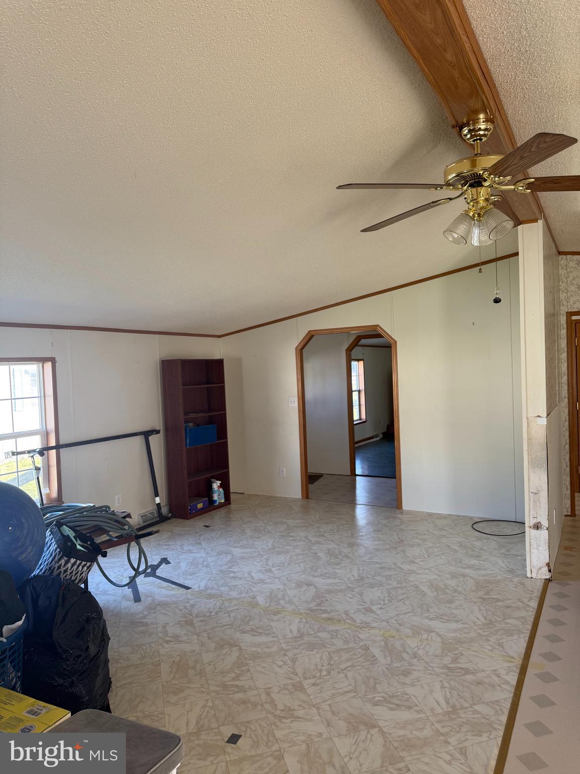 102 Front Street Centre Hall, PA 16828 - Photo 3 of 11 a view of a livingroom with wooden floor and cabinet