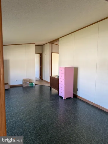 a room with a couch and a window