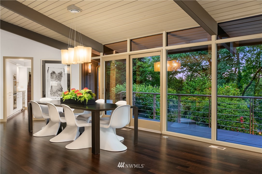 110 Northside Road Bellevue, WA 98004 - Photo 13 of 37 a dining room with furniture and floor to ceiling window