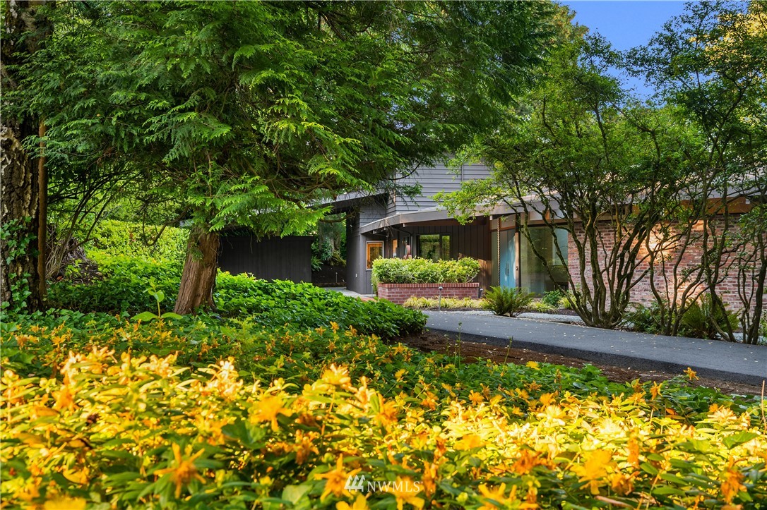 110 Northside Road Bellevue, WA 98004 - Photo 3 of 37 a front view of a house with a yard