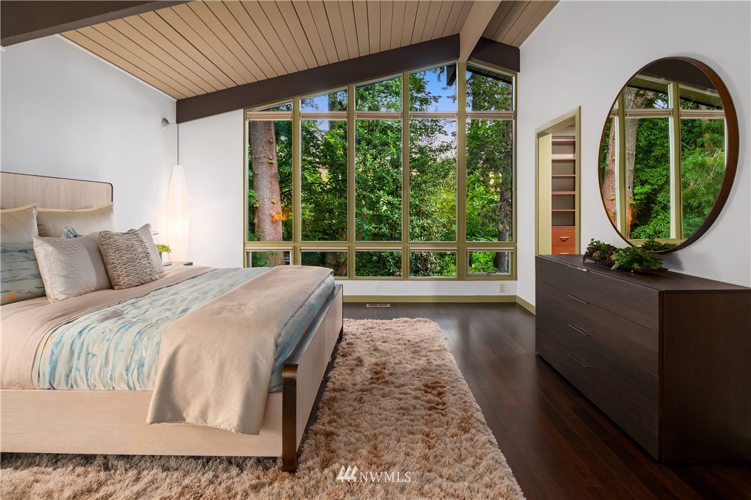 110 Northside Road Bellevue, WA 98004 - Photo 21 of 37 a bed sitting in a bedroom next to a window