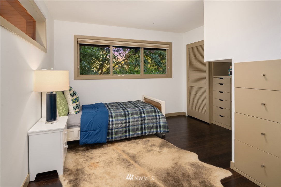 110 Northside Road Bellevue, WA 98004 - Photo 24 of 37 a bedroom with a bed and dresser