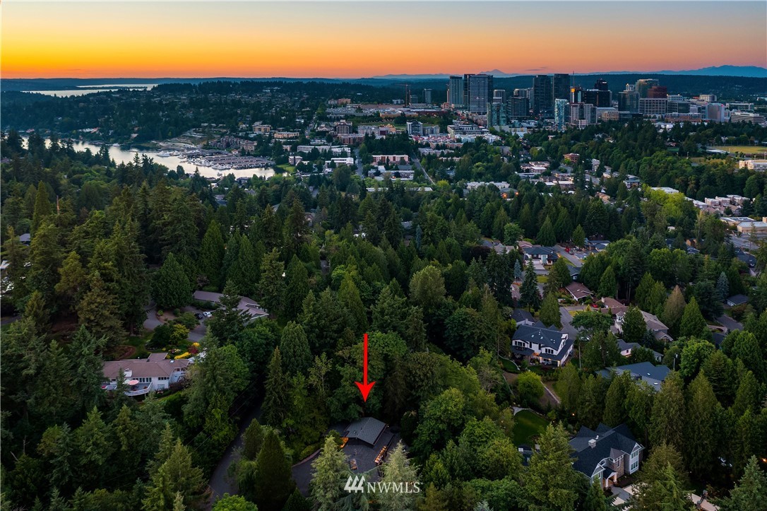110 Northside Road Bellevue, WA 98004 - Photo 36 of 37 a view of a house with a yard and lake view
