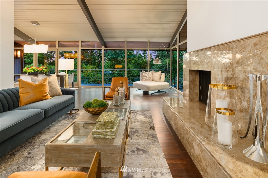 110 Northside Road Bellevue, WA 98004 - Photo 9 of 37 a balcony with furniture and a large window