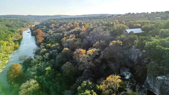 a view of a lot of trees and houses