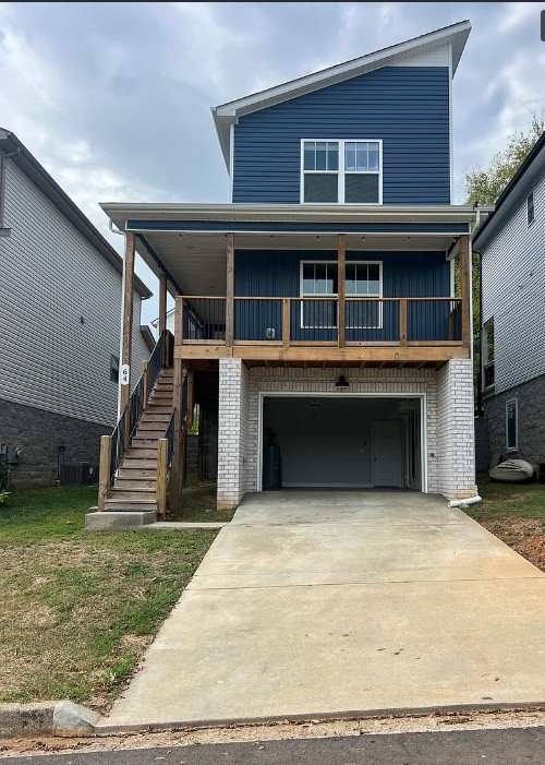 64 West High Street Clarksville, TN 37040 - Photo 5 of 18 a view of a house with a swimming pool