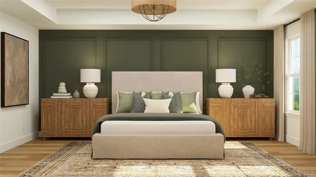 a bedroom with a bed and cabinets