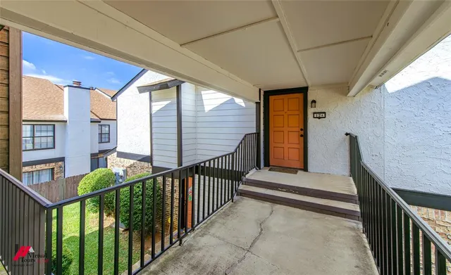a view of a balcony and stairs