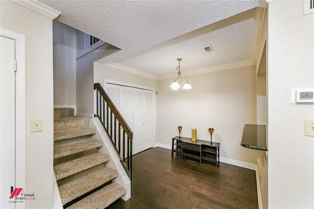 a view of entryway and workspace