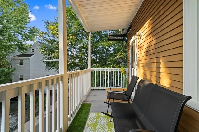 a view of swimming pool with outdoor seating