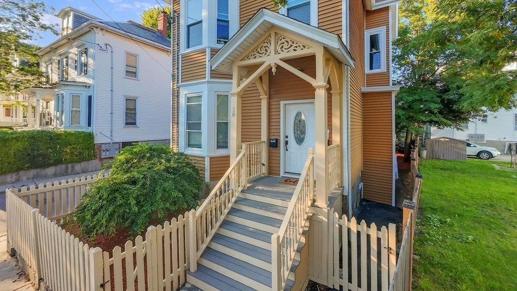 18 Holborn Street Boston, MA 02121 - Photo 29 of 33 a front view of a house with a yard