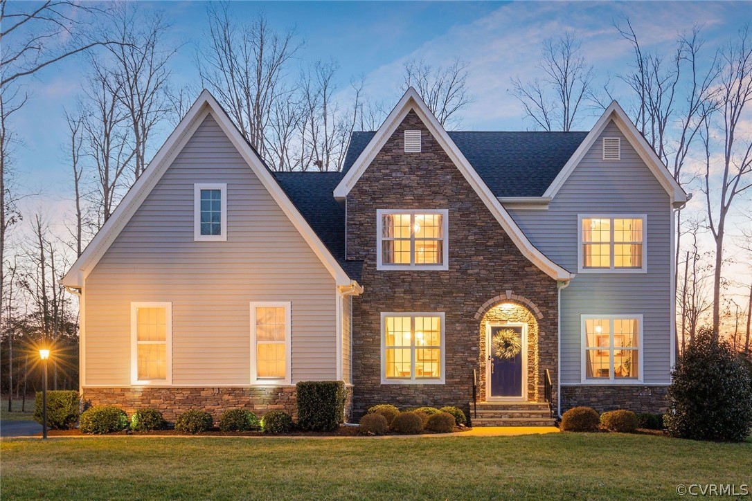 1348 Miners Trail Road Midlothian, VA 23114 - Photo 1 of 49 a front view of a house with a yard