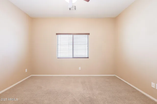 a view of a bathroom from a hallway