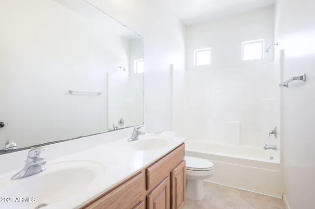 a view of a hallway with seating area