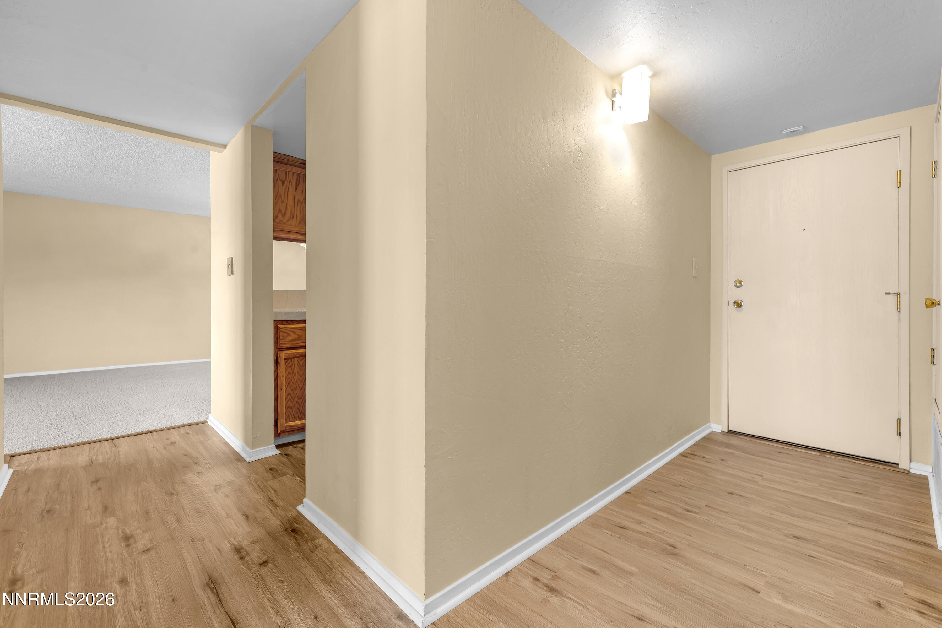 2845 Idlewild Drive, Unit 204 Reno, NV 89509 - Photo 20 of 29 a view of hallway with wooden floor