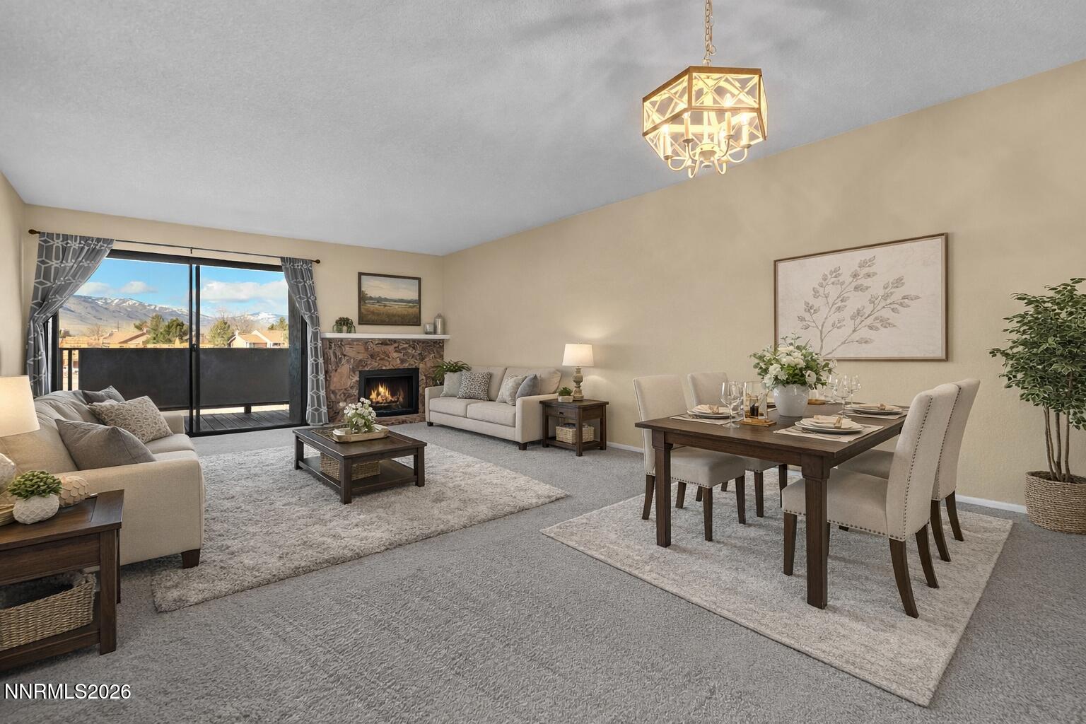 2845 Idlewild Drive, Unit 204 Reno, NV 89509 - Photo 2 of 29 a view of a livingroom with furniture and a chandelier
