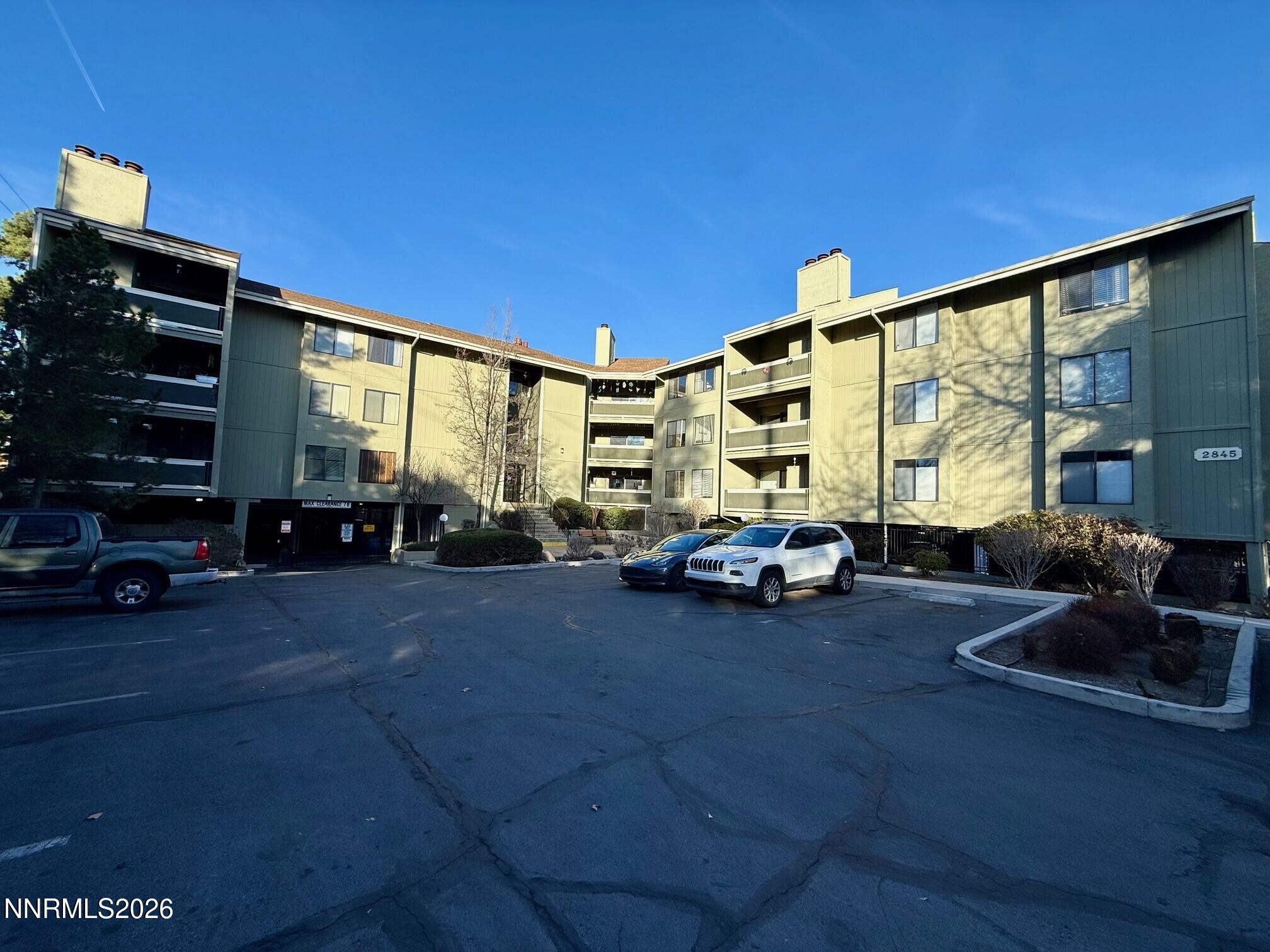 2845 Idlewild Drive, Unit 204 Reno, NV 89509 - Photo 26 of 29 a view of car parked in front of house