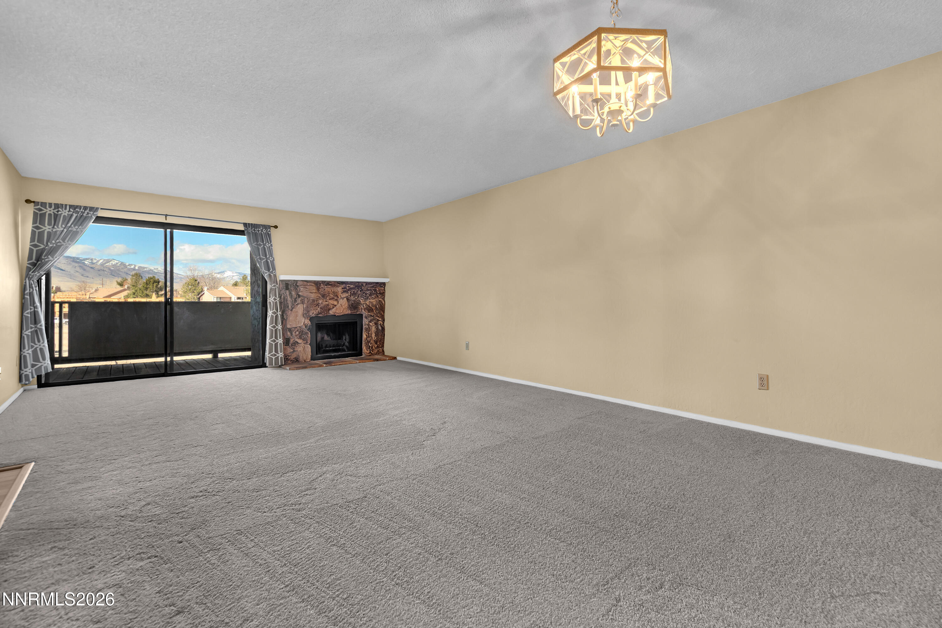 2845 Idlewild Drive, Unit 204 Reno, NV 89509 - Photo 3 of 29 an empty room with a window