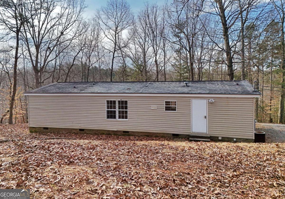 273 Rose Ray Road Ellijay, GA 30540 - Photo 15 of 32 a house view with a outdoor space