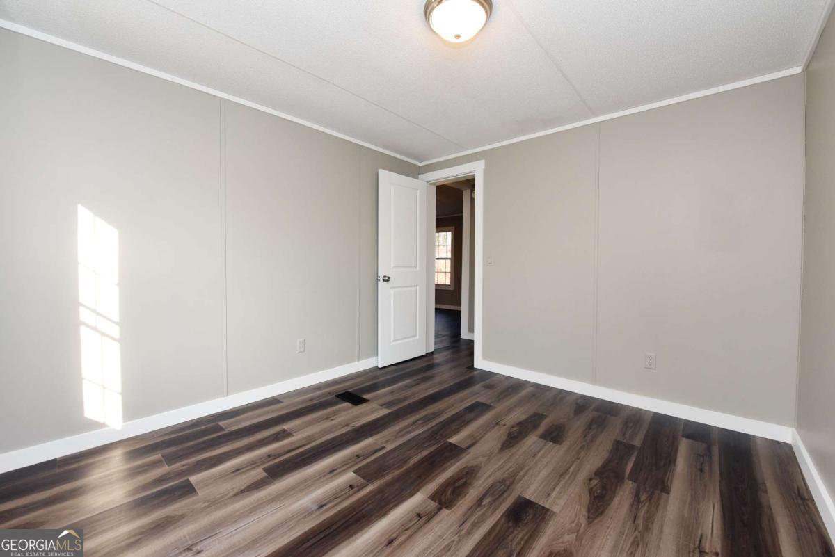 273 Rose Ray Road Ellijay, GA 30540 - Photo 21 of 32 a view of an empty room