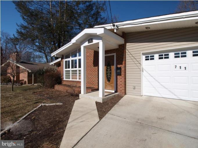 711 North Belgrade Road Silver Spring, MD 20902 - Photo 12 of 25 a front view of a house with garden