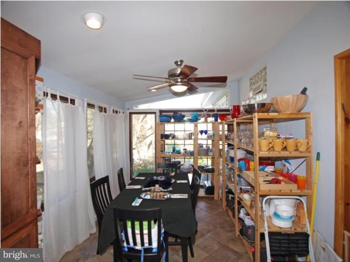 711 North Belgrade Road Silver Spring, MD 20902 - Photo 18 of 25 a view of a dining room with furniture and chandelier