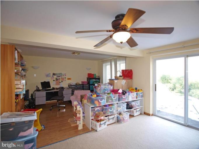 711 North Belgrade Road Silver Spring, MD 20902 - Photo 6 of 25 a living room with furniture and a large window